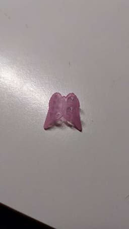 Rosa fjärilsformad dekoration bild 1